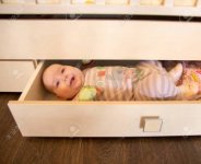 baby-girl-in-a-drawer-for-things.jpg