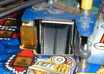 www.pinballzone.com_tech_images_tz_yellowslot.jpg