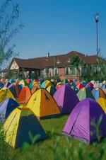20250915_1650_Festival Tents on Lawn_remix_01k570zwnbf6vvwm1a4fy02kth.webp