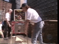 gif Joker Poker getting thrown off a 5 storey roof by Letterman.gif