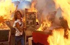 Tommy_burning_pinball_machines.jpg